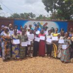 Remise des certificats de fin de formation sur la couture avec AJORA